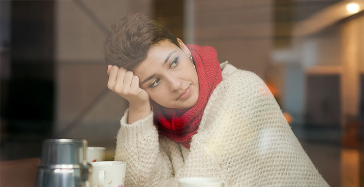 Woman tired at coffee shop