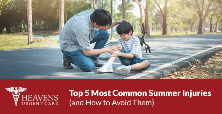 Asian father comforting his son. Son sitting on bike path holding his knee.